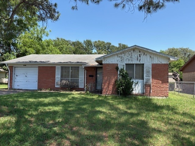 4317 Gram Ln, Waco, TX 76705 - ranch-style house featuring brick siding, an attached garage, and asphalt driveway