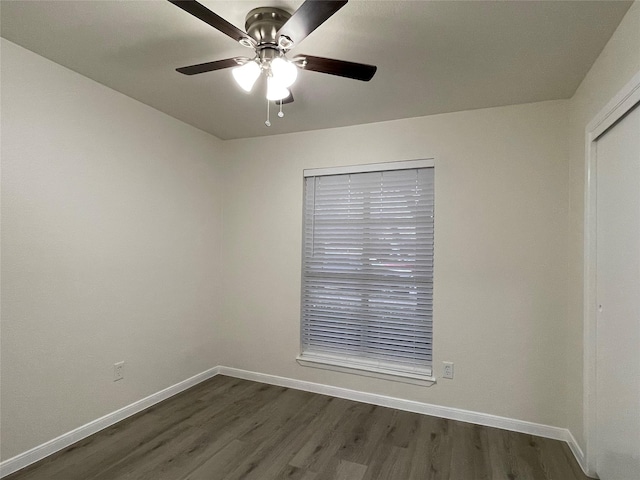 2113 Glencrest Ln, Garland, TX 75040 - spare room featuring dark wood-style floors and a ceiling fan