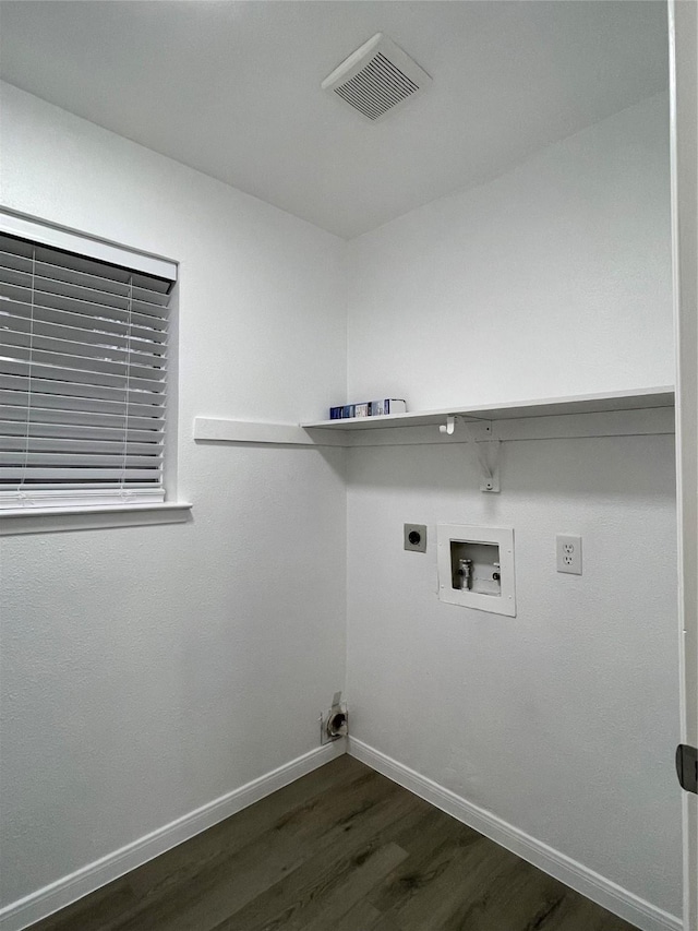 2113 Glencrest Ln, Garland, TX 75040 - laundry area with dark wood finished floors, hookup for a washing machine, and hookup for an electric dryer