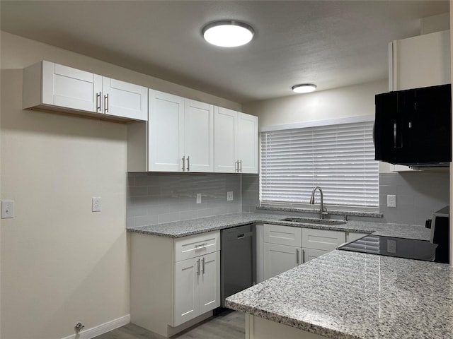 2113 Glencrest Ln, Garland, TX 75040 - kitchen with white cabinetry, light stone countertops, and decorative backsplash