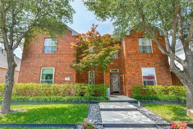 1504 Vista Bend Dr, Allen, TX 75002 - traditional-style home with brick siding and a front yard