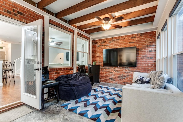 1504 Vista Bend Dr, Allen, TX 75002 - living area featuring a ceiling fan, beamed ceiling, and brick wall