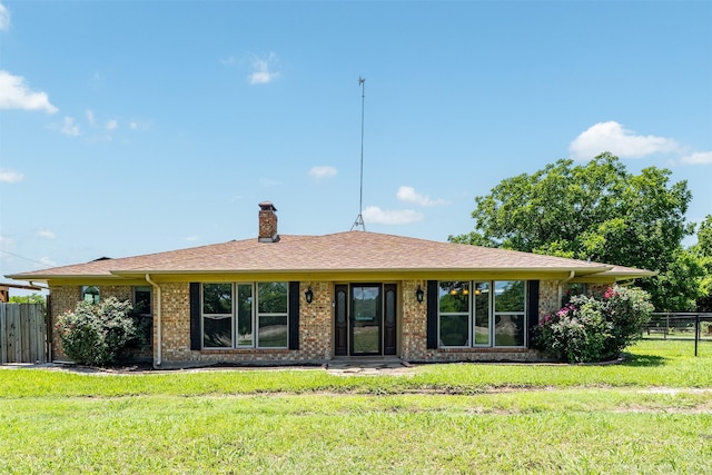 10202 Fm 1895, Kaufman, TX 75142 - view of front facade with a chimney and brick siding