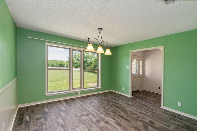 10202 Fm 1895, Kaufman, TX 75142 - empty room featuring dark wood-type flooring and a textured ceiling