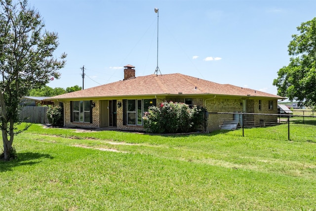 10202 Fm 1895, Kaufman, TX 75142 - rear view of property featuring a chimney and brick siding
