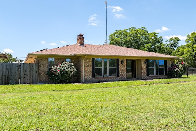 10202 Fm 1895, Kaufman, TX 75142 - view of front of house with a chimney, brick siding, and roof with shingles