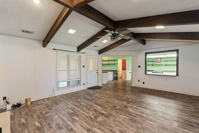 10202 Fm 1895, Kaufman, TX 75142 - unfurnished living room with wood finished floors, ceiling fan, a textured ceiling, and healthy amount of natural light