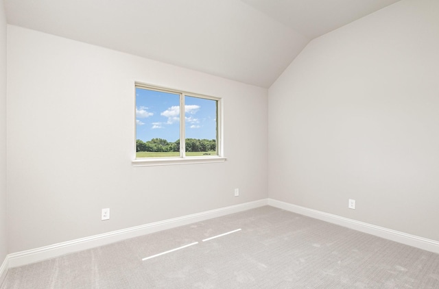 7050 Champion Rd, Midlothian, TX 76065 - carpeted empty room with vaulted ceiling and baseboards