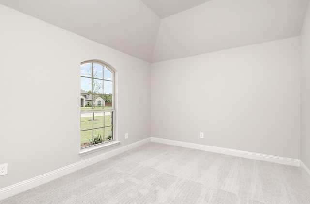 7050 Champion Rd, Midlothian, TX 76065 - spare room with light carpet and vaulted ceiling