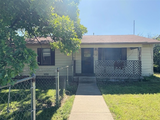607 Baylor St, Nocona, TX 76255 - view of front of house featuring covered porch and roof with shingles