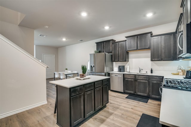 2016 Saddle Way, Mesquite, TX 75149 - kitchen featuring stainless steel appliances, light wood-style floors, light countertops, and recessed lighting