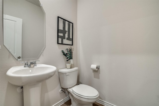 2016 Saddle Way, Mesquite, TX 75149 - bathroom featuring toilet and a sink