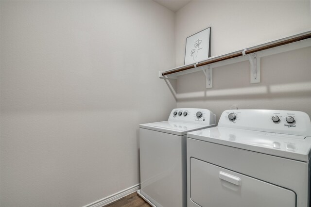 2016 Saddle Way, Mesquite, TX 75149 - washroom with washer and clothes dryer and dark wood-type flooring