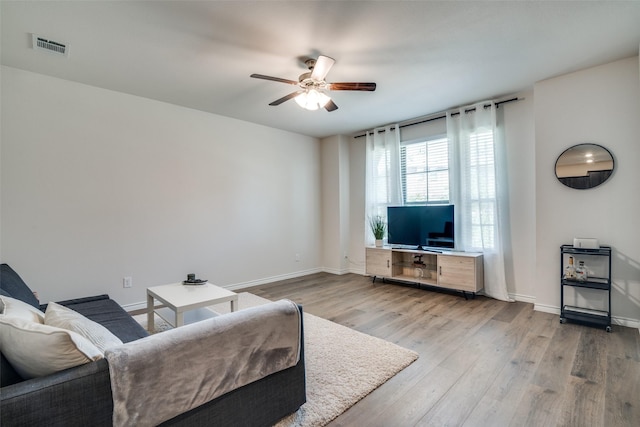 2016 Saddle Way, Mesquite, TX 75149 - living room featuring a ceiling fan and wood finished floors