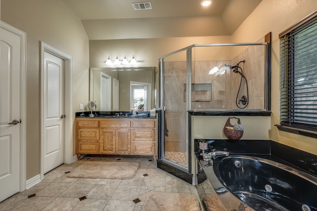 3231 Mccarver Ct, Midlothian, TX 76065 - bathroom featuring a stall shower, vanity, and a whirlpool tub