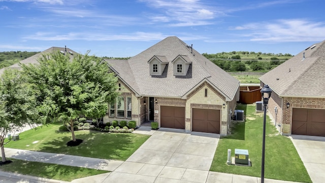 15005 Teasley Ave, Aledo, TX 76008 - french country inspired facade with brick siding, stone siding, driveway, a shingled roof, and a front lawn