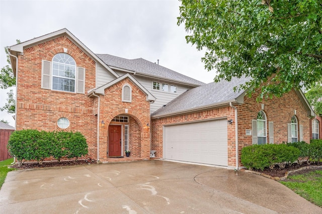 3504 Brookside Dr, Wylie, TX 75098 - traditional-style home featuring concrete driveway, a garage, brick siding, and a shingled roof