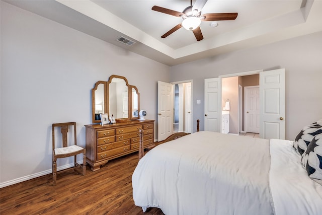 3504 Brookside Dr, Wylie, TX 75098 - bedroom featuring a tray ceiling, wood finished floors, and ceiling fan
