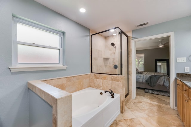 5820 Forest Ln, Dallas, TX 75230 - bathroom with a shower stall, a garden tub, vanity, ensuite bathroom, and a ceiling fan