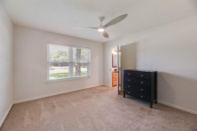5820 Forest Ln, Dallas, TX 75230 - unfurnished bedroom featuring carpet floors and a ceiling fan