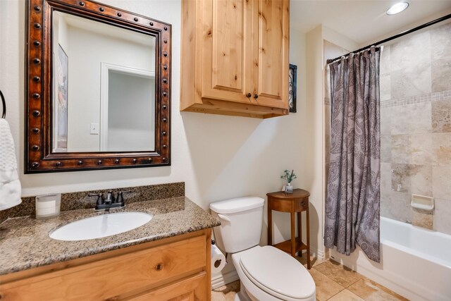 5820 Forest Ln, Dallas, TX 75230 - bathroom featuring vanity, shower / bath combo with shower curtain, and tile patterned flooring