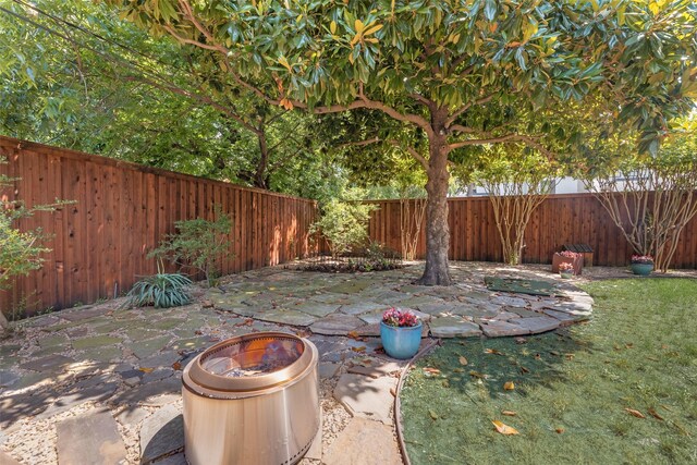 5820 Forest Ln, Dallas, TX 75230 - fenced backyard with a patio