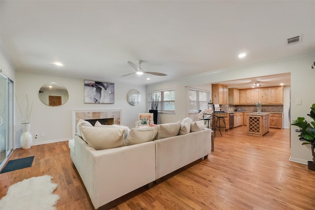 5820 Forest Ln, Dallas, TX 75230 - living room featuring ceiling fan, recessed lighting, crown molding, light wood-style floors, and a fireplace