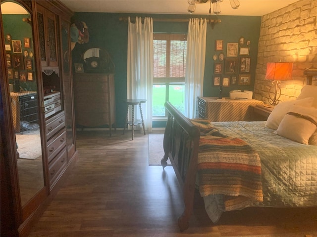 8918 Bellechase Rd, Granbury, TX 76049 - bedroom with wood finished floors and baseboards