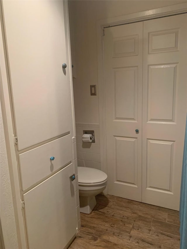 8918 Bellechase Rd, Granbury, TX 76049 - bathroom featuring wood finished floors and toilet