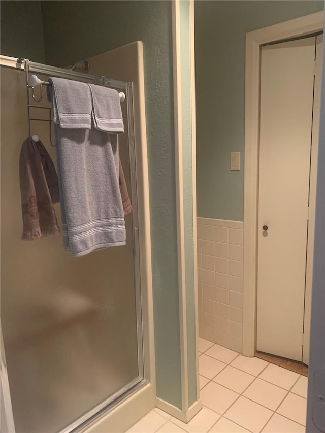 8918 Bellechase Rd, Granbury, TX 76049 - full bath with tile patterned floors and a shower stall