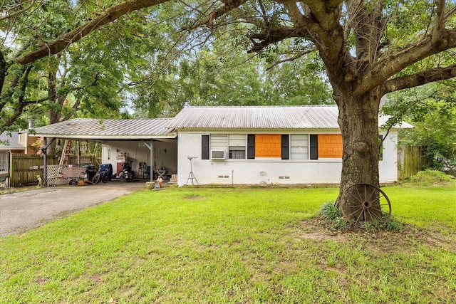 115 Red Bud Rd, Gun Barrel City, TX 75156 - ranch-style home featuring asphalt driveway, a carport, a metal roof, cooling unit, and crawl space
