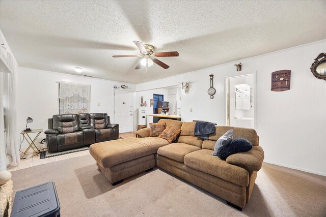 115 Red Bud Rd, Gun Barrel City, TX 75156 - carpeted living area with a ceiling fan and a textured ceiling