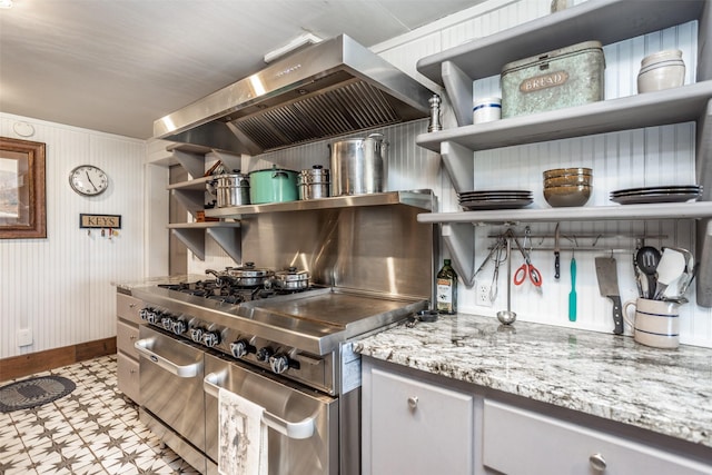 2473 Oil, City, Wilson, OK 73463 - kitchen with open shelves, ventilation hood, light floors, double oven range, and light stone countertops