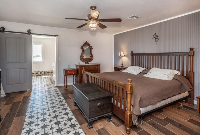2473 Oil, City, Wilson, OK 73463 - bedroom with wood finished floors and ceiling fan