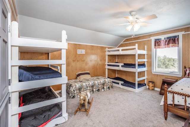 2473 Oil, City, Wilson, OK 73463 - bedroom featuring wooden walls, carpet floors, and vaulted ceiling