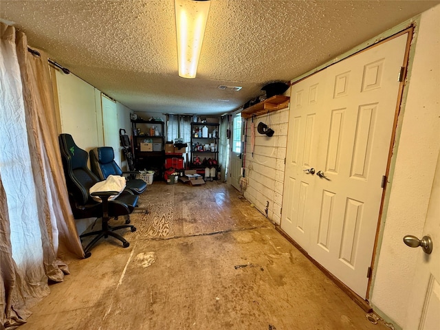 603 N Mesquite St, Hico, TX 76457 - home office featuring a textured ceiling