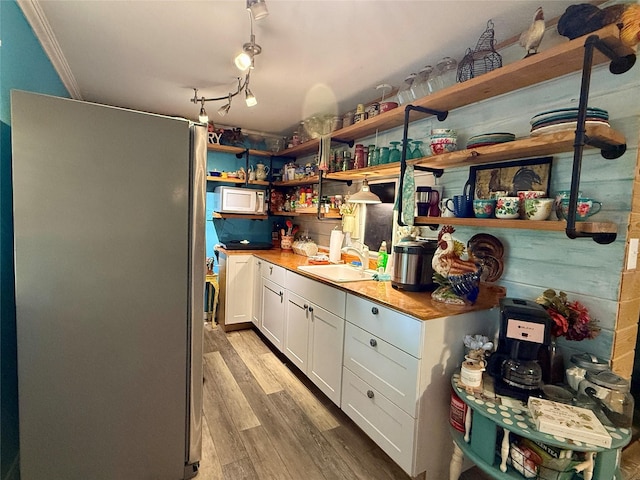 603 N Mesquite St, Hico, TX 76457 - storage area featuring a sink