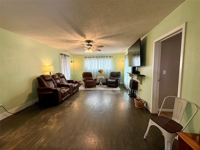 603 N Mesquite St, Hico, TX 76457 - living area with wood finished floors, a textured ceiling, and ceiling fan