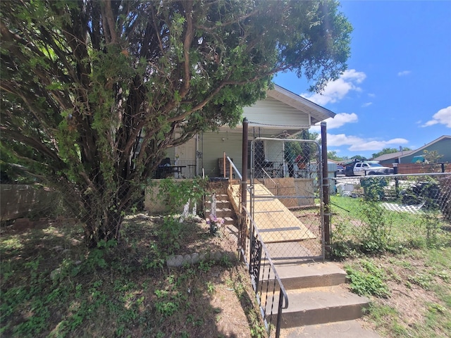 2514 NW 26th St, Fort Worth, TX 76106 - view of front of home featuring a gate and a porch