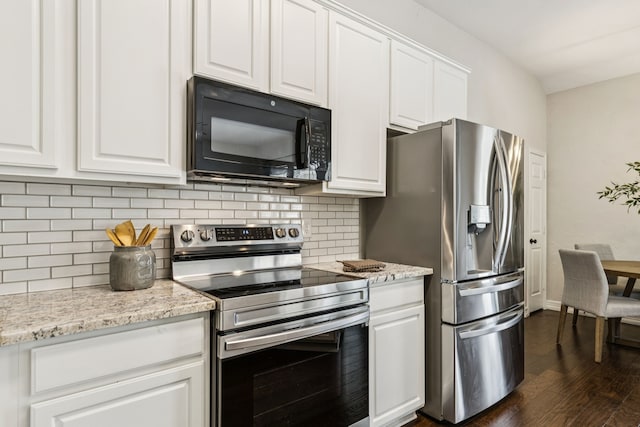 7105 Stoneridge Dr, Frisco, TX 75034 - kitchen with stainless steel appliances, decorative backsplash, dark wood-style floors, and white cabinets