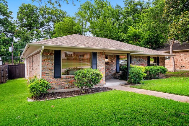 10017 Lanshire Dr, Dallas, TX 75238 - ranch-style house featuring roof with shingles and brick siding