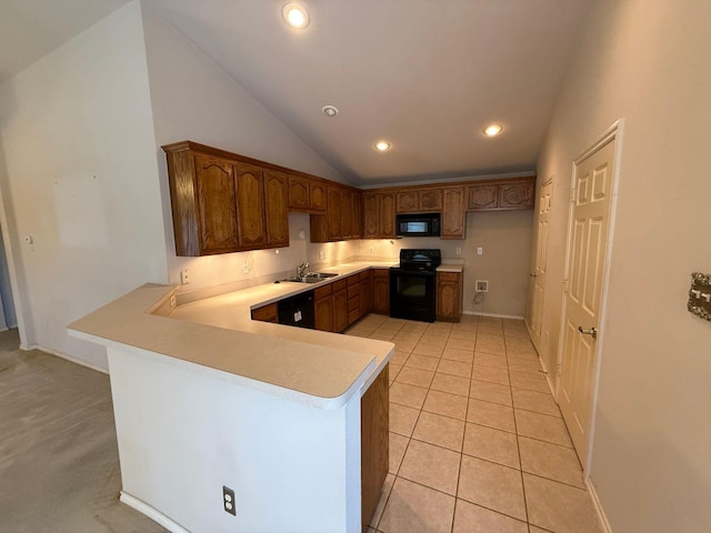 6437 Regina Dr, Fort Worth, TX 76131 - kitchen with black appliances, a peninsula, light countertops, lofted ceiling, and recessed lighting