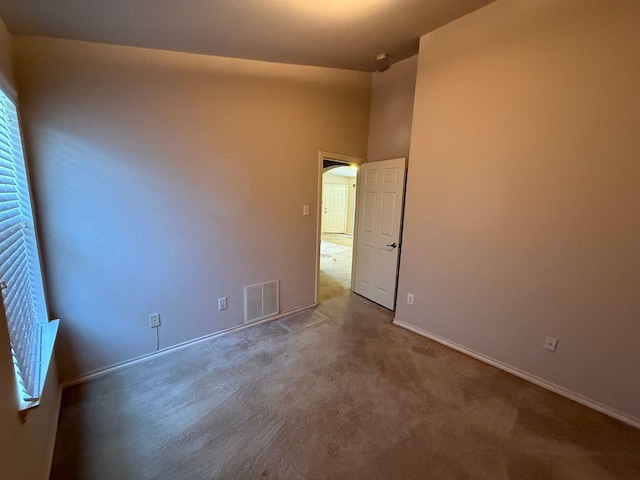 6437 Regina Dr, Fort Worth, TX 76131 - empty room with carpet floors and arched walkways