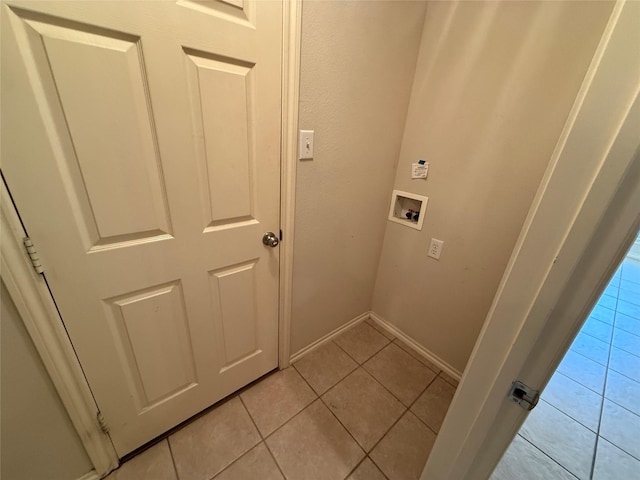 6437 Regina Dr, Fort Worth, TX 76131 - laundry room with washer hookup and light tile patterned floors