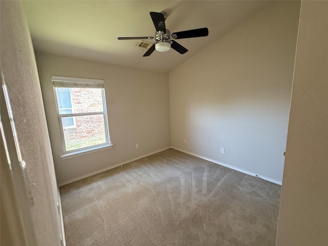 6437 Regina Dr, Fort Worth, TX 76131 - spare room featuring vaulted ceiling, carpet flooring, and a ceiling fan
