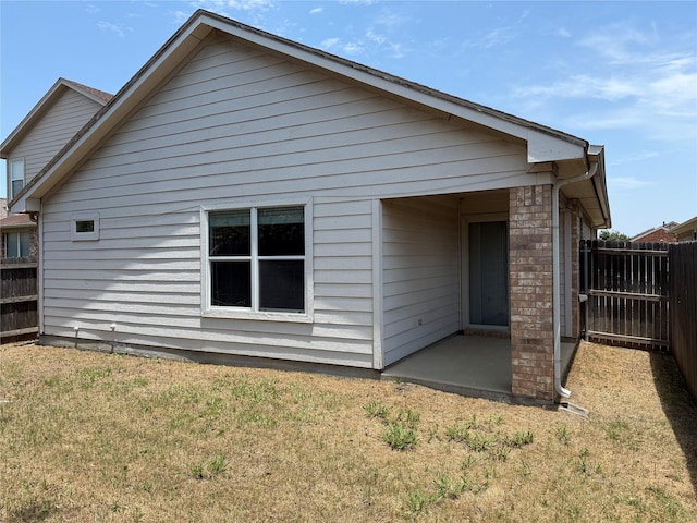 6437 Regina Dr, Fort Worth, TX 76131 - rear view of property with a patio area