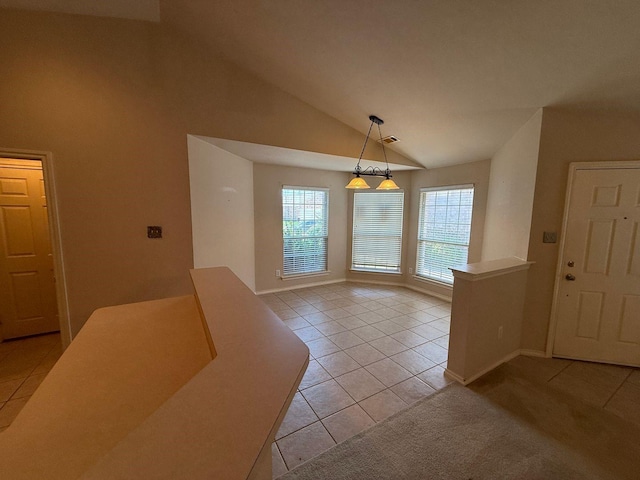 6437 Regina Dr, Fort Worth, TX 76131 - foyer entrance featuring vaulted ceiling and light tile patterned floors