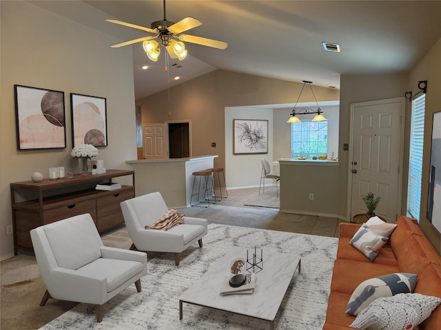 6437 Regina Dr, Fort Worth, TX 76131 - living area with vaulted ceiling, plenty of natural light, and a ceiling fan