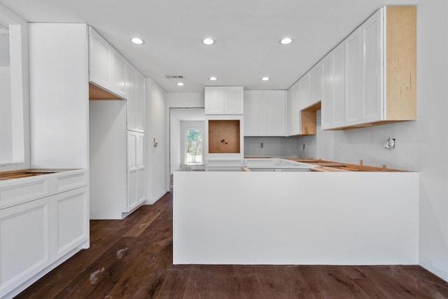 4209 Brooktree Ln, Dallas, TX 75287 - kitchen featuring recessed lighting, dark wood-style flooring, and white cabinetry