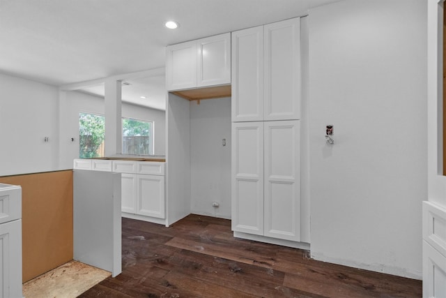 4209 Brooktree Ln, Dallas, TX 75287 - kitchen with dark wood-type flooring, white cabinets, recessed lighting, and light countertops